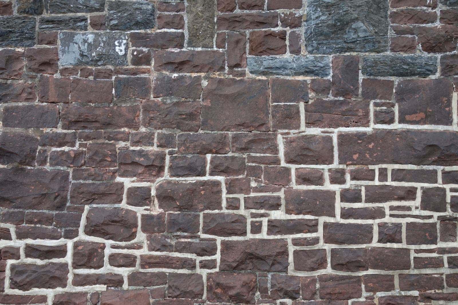 Old sandstone and brick wall