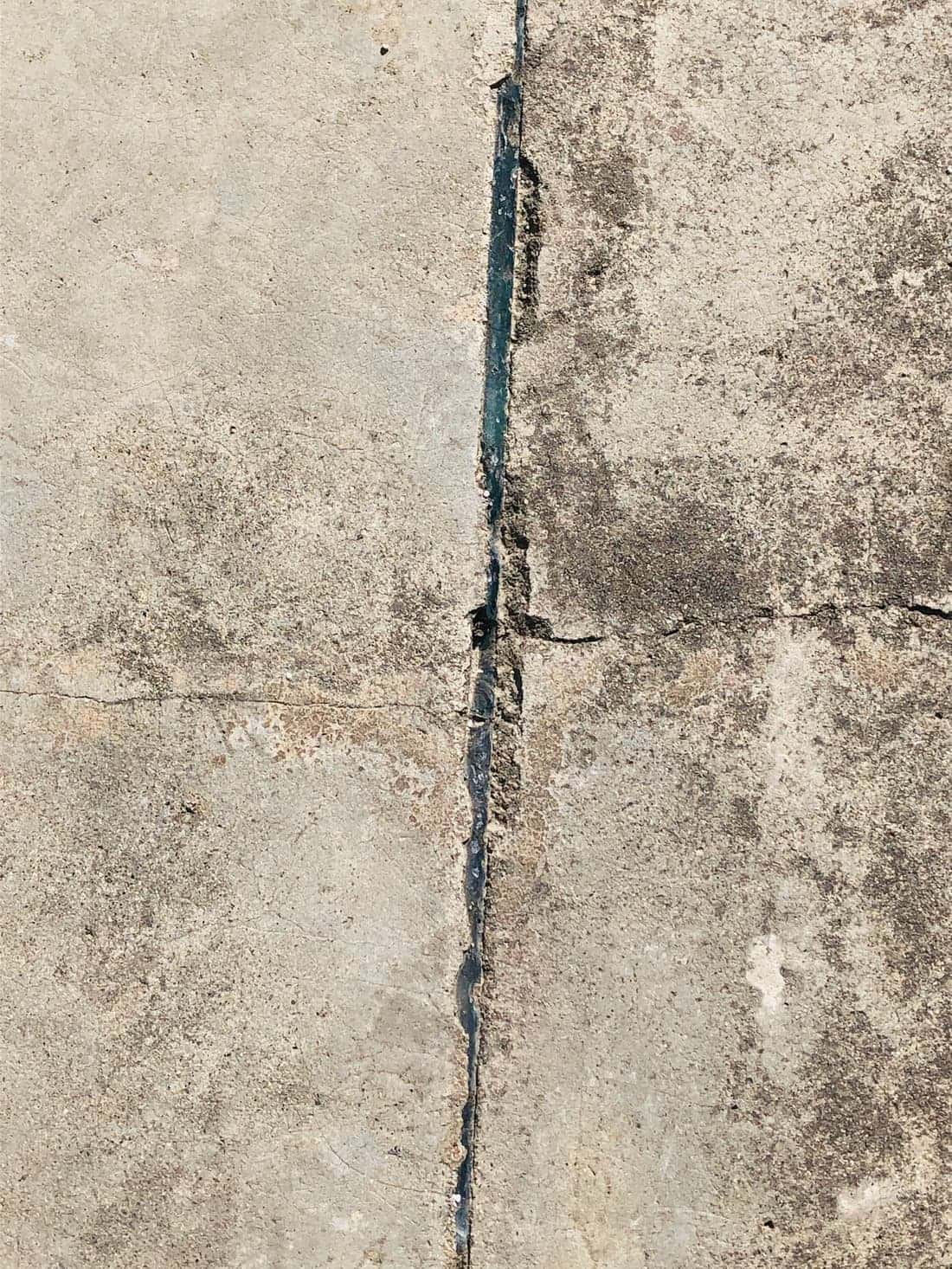 Crack running through a concrete foundation wall